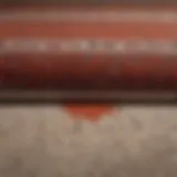 A close-up view of a vibrant carpet with a noticeable deep stain