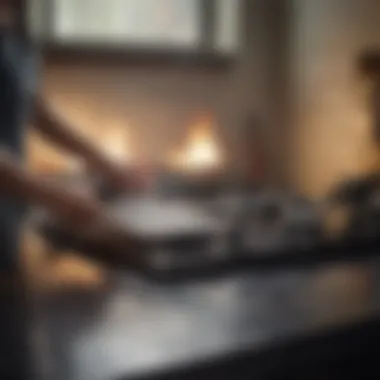 A person demonstrating cleaning technique on a flat top stove