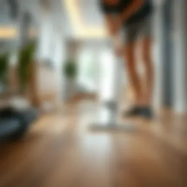 Demonstrating Proper Cleaning Technique Demonstrating proper cleaning technique on laminate wood flooring