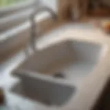 Clear view of a kitchen sink with water flowing smoothly