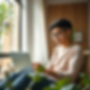 Mastering Your Finances for Independence A young person budgeting their finances with a laptop