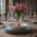 Elegantly set dining table with fine china and crystal glassware