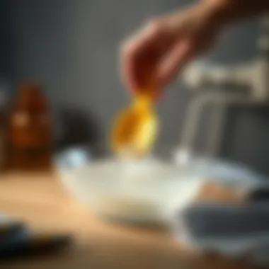 Vinegar and Water Mixture for Cleaning Mixing vinegar with water in a bowl